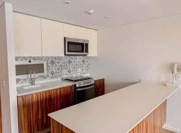 Cocina y Barra desayunador · Depa 1 Recámaras con Increíbles Amenidades en Parques Plaza Nuevo Polanco