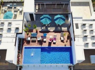 Departamento · 121m² · 2 Recámaras · 1 Estacionamiento · Tu Refugio en El Caribe: Moderno 2br en El Corazón de Playa