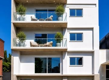 Fachada moderna de desarrollo boutique de solo 7 d · Departamento en Preventa de 69 m² con Estudio y Balcón | Moctezuma, Cdmx