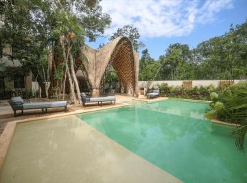 Departamento · 145m² · 2 Recámaras · 2 Estacionamientos · Departamento Amueblado con Alberca Privada en Venta Holistika Tulum
