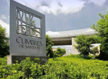 db444a0cb73f76652b356309d4118241c0d1b99c8eeb820520327e72a88a268d · Terreno en Cumbres de Santa Fe
