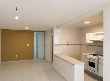 Estancia y cocina · Departamento en Venta en Álamos | 2 Recámaras + Estacionamiento Independiente