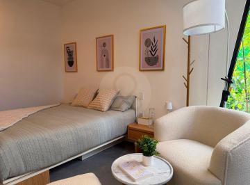 cama y sillon.jpeg · Xenter: Departamento en Venta en Granada