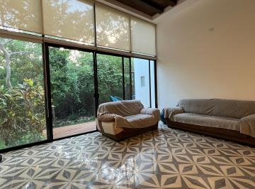 Sala con ventanal · Casa en Selvamar Mantenimiento Incluido