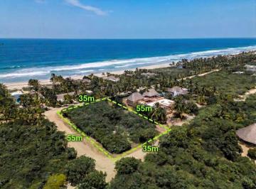 Vista aérea del lote de playa. · Lote de Playa en Comunidad Cerrada de Puerto Escondido
