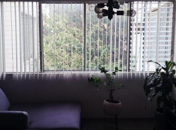 Salón · Departamento de 2 Recámaras, 2 Baños y Estudio