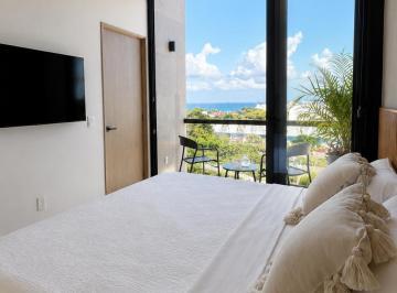 Departamento de 1 habitación, Solidaridad · Departamento en Playa del Carmen con Vista Al Mar y Amenidades.