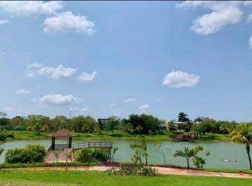 28cedbd7341e6225bd014f2b5cab172b8be6e4a8cd864ecb3f4bec0c2f9b989d · Terreno en Venta con Vista Al Cenote, Privada Kilil, Yucatán Country Club.