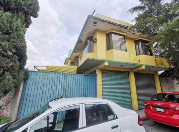 Casa · 114m² · 2 Recámaras · 1 Estacionamiento · Casa con Local Comercial y Estacionamiento en Venta