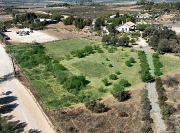 f6079c8adbb6280df10c2025be2d1d0daf26611f4a0fbd4674bd8874051ce19f · Terreno en Venta en Valle de Guadalupe Vecino de Vinicola Magoni