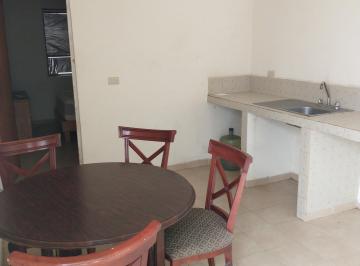 Cocina · Departamento en La Fuentes por Calle 20