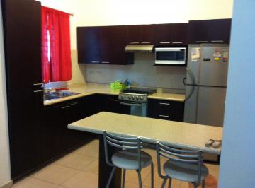 Cocina · Departamento Amueblado en Céntrika Victoria