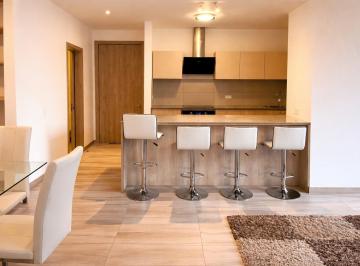 Suite · 66m² · 1 Habitación · 1 Estacionamiento · Suite Amoblada en Venta en Cumbayá - Edificio Aurora Sobre Ruta Viva