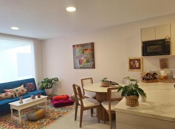 Departamento · 49m² · 1 Habitación · 1 Estacionamiento · Suite de Venta en Edificio Moderno