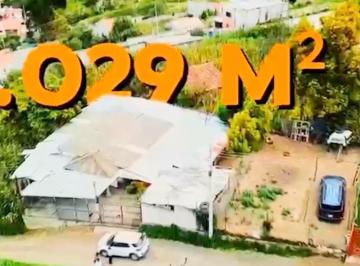 Terreno / Lote · 60m² · 2 Habitaciones · 4 Estacionamientos · De Oportunidad Terreno 1029 m² con Casa en Venta - Azogues